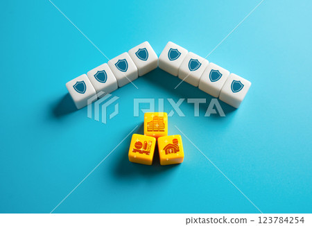 Protection of the economy. Protectionism. Tariffs, trade barriers, and policies. Shield domestic industries. Foreign competition to promote national growth. 123784254