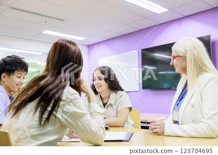 Students and professor having a meeting 123784695