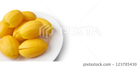 Marian plum or Plum mango fruit in the dish on white background with clipping path Marian plum or Plum mango fruit in the dish on white background with clipping path 123785430