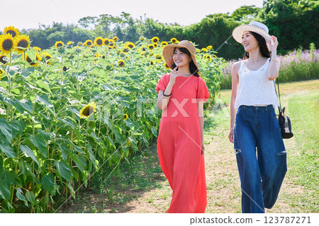 Sunflower field and women 123787271