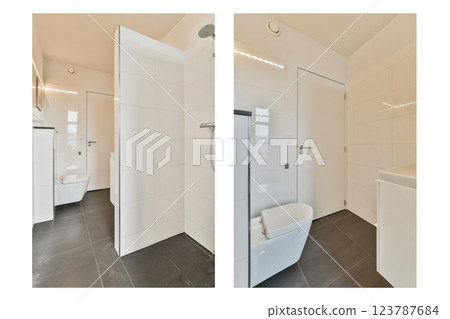 A sleek and modern bathroom showcasing minimalist design with white tiles and efficient layout. Clean lines create a serene atmosphere. A sleek and modern bathroom showcasing minimalist design with white tiles and efficient layout. Clean lines create a serene atmosphere. 123787684