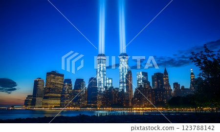 A symbolic tribute using a modern aesthetic to feature the twin towers in the New York skyline under twilight 123788142