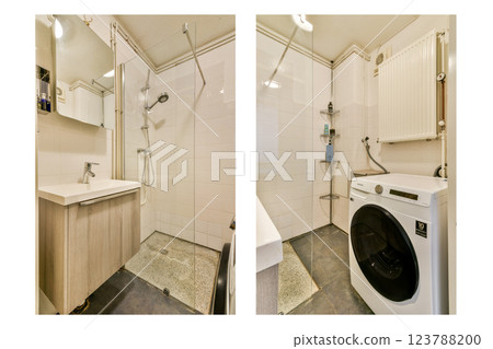 A contemporary bathroom featuring a shower, sink, and space for a washing machine. The clean design highlights functionality and modern aesthetics. 123788200