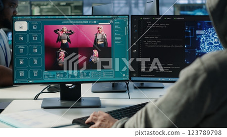 Admin in server hub coding AI program turning text prompt into photos. IT expert in data center using computer to build text to image artificial intelligence generative models, camera A Admin in server hub coding AI program turning text prompt into photos. IT expert in data center using computer to build text to image artificial intelligence generative models, camera A 123789798