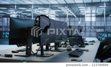 Artificial intelligence applications used in data center workplace to maintain company network equipment, handheld camera shot. AI programs used in server room to ensure optimal system performance 123789894