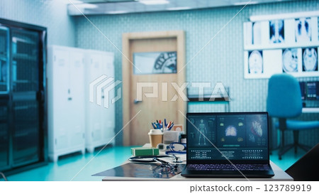 Empty medical office equipped with diagnostic tools and blood pressure monitor set for healthcare consultations and medical research to provide accurate diagnosis and patient care. Empty medical office equipped with diagnostic tools and blood pressure monitor set for healthcare consultations and medical research to provide accurate diagnosis and patient care. 123789919