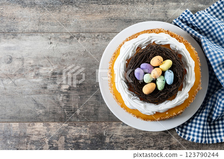 Homemade Easter egg cake on wooden table 123790244