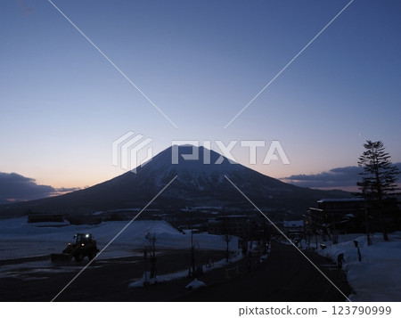 View of the crescent moon rising from Mt. Yotei at dawn from Niseko Tokyu Grand Hirafu Dot Base View of the crescent moon rising from Mt. Yotei at dawn from Niseko Tokyu Grand Hirafu Dot Base 123790999
