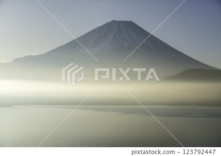 Mount Fuji floating in a sea of clouds shining in the morning sun from Lake Motosu Nakanokura Observatory 123792447