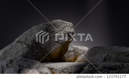 Natural stone podium for product placement, textured rock surface, neutral background, product showcase, earthy tones, stone slab, empty stage, natural rock backdrop, item placement 123793177