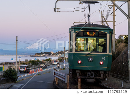 Mount Fuji and the Enoshima Electric Railway at sunrise from Shichirigahama in Kamakura Mount Fuji and the Enoshima Electric Railway at sunrise from Shichirigahama in Kamakura 123793229
