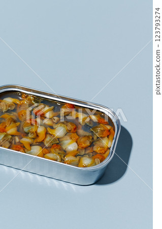 closeup of an open can of tinned cockles 123793274