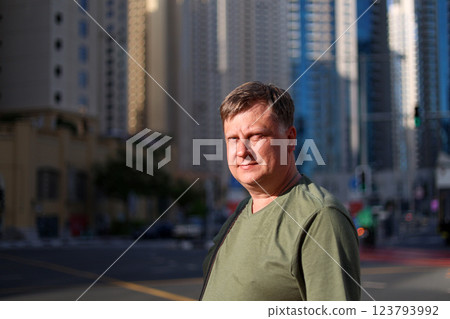 Portrait of a man waiting for the green light at an intersection Portrait of a man waiting for the green light at an intersection 123793992