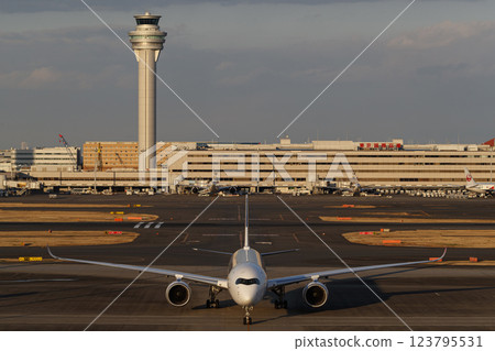 Control tower and plane Control tower and plane 123795531