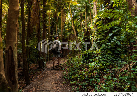 Traveller man in rain forest on footpath in Santa Catarina, Brazil. 123798064