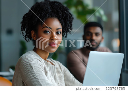 Portrait of an African American businesswoman working on her laptop in a coffee shop 123798765