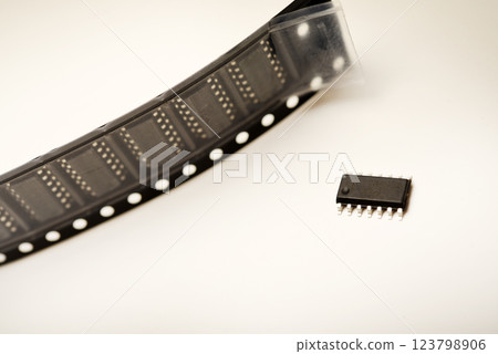 The microcircuit is in the packing tape. The microcircuit is in the packing tape. 123798906