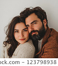Real love. Beautiful young couple bonding and smiling while sitting in the bedroom. Postcard for couple in love, wedding card, atmosphere of love devotion h 123798938