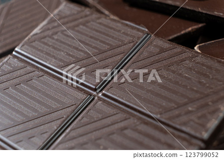 Delicious dark chocolate segments, rich black chocolate texture 123799052