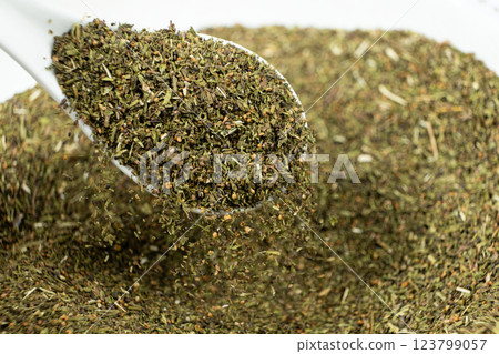 Savory herb seasoning in a spoon macro 123799057