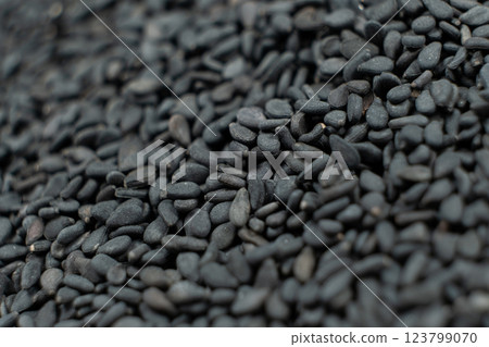 Raw black sesame seeds close-up macro texture Raw black sesame seeds close-up macro texture 123799070