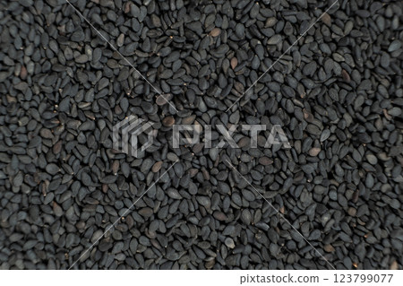 Whole black sesame seeds top view detailed shot 123799077