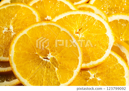Juicy orange background made from sliced orange 123799092