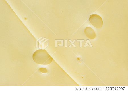 Semi-hard cheese close-up, thin slices, top view 123799097