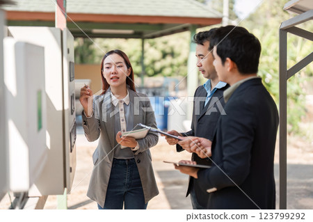 Eco-conscious business meeting. Professionals aligning on sustainable business practices in a collaborative outdoor setting. 123799292