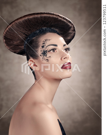 Beautiful woman with disc hairstyle 123799511