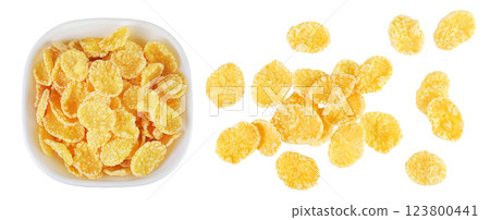 Cornflakes in ceramic bowl isolated on white background. Cornflakes in ceramic bowl isolated on white background. 123800441
