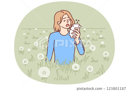 Woman sneezes because of allergy caused by dandelion blossoms and pollen from summer plants Woman sneezes because of allergy caused by dandelion blossoms and pollen from summer plants 123801187