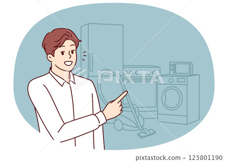 Man appliances salesman points finger at washing machine and vacuum cleaner with refrigerator 123801190