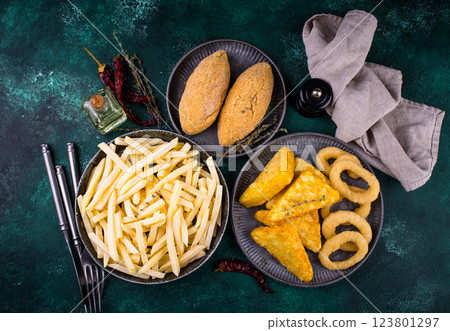 Frozen food assortment. Potato hashbrowns and french fries Frozen food assortment. Potato hashbrowns and french fries 123801297