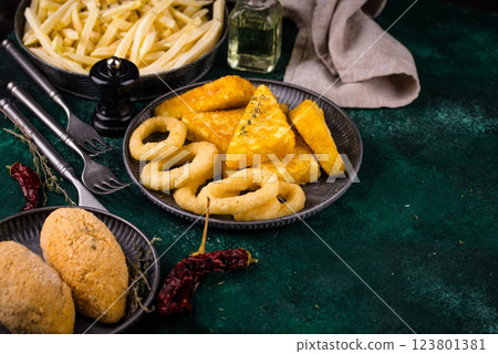 Frozen food assortment. Potato hashbrowns and french fries 123801381