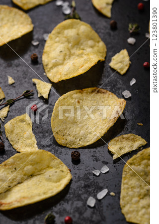 Crispy salty homemade potato chips Crispy salty homemade potato chips 123801390