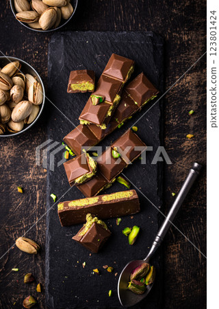 Dubai chocolate with kadayif pistachio filling Dubai chocolate with kadayif pistachio filling 123801424