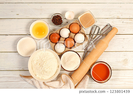 Kitchen baking background and recipe for cake, bread, pastry and ingredients for cooking, milk, honey, flour, salt, sugar, eggs, yeast and cream, modern bakery concept, Kitchen baking background and recipe for cake, bread, pastry and ingredients for cooking, milk, honey, flour, salt, sugar, eggs, yeast and cream, modern bakery concept, 123801439