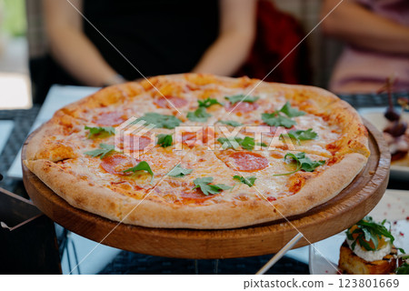 Fresh baked pepperoni pizza close up Fresh baked pepperoni pizza close up 123801669