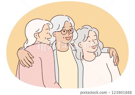 Three elderly women laugh and hug for first time having met after long separation Three elderly women laugh and hug for first time having met after long separation 123801888