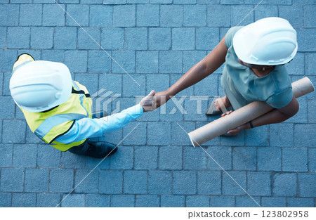 Architect partnership, client handshake and construction worker meeting at building site, property deal or engineering trust. Above industrial contractor shaking hands, agreement or design consulting Architect partnership, client handshake and construction worker meeting at building site, property deal or engineering trust. Above industrial contractor shaking hands, agreement or design consulting 123802958