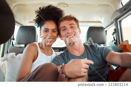 Portrait, diversity couple and in car on holiday being together romantic, bonding and excited for road trip. Love, man and woman travel on vacation, romance break and enjoy loving getaway in vehicle. 123803214