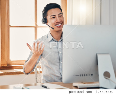 Call center, telemarketing and customer support consultant working on a computer in modern office. Happy, smile and asian man doing online consultation for ecommerce sales, customer service and crm. 123803230