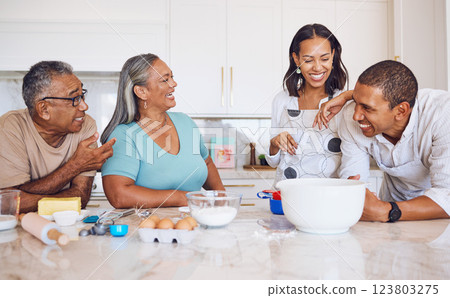 Happy big family, kitchen and baking, cooking or talking in home together. Love, grandparents and man, woman and comic conversation, bonding and discussion spending quality time together in house. 123803275