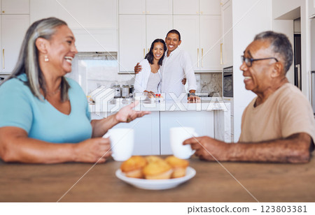 Family, coffee and senior parents talking at living room table with children listening to their story in house. Comic and elderly man and woman speaking about retirement with drink of tea and kids Family, coffee and senior parents talking at living room table with children listening to their story in house. Comic and elderly man and woman speaking about retirement with drink of tea and kids 123803381