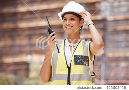 Woman engineer, construction and communication with walkie talkie, technology and safety check working. Construction worker, industry and protection helmet, radio supervision and leadership. Woman engineer, construction and communication with walkie talkie, technology and safety check working. Construction worker, industry and protection helmet, radio supervision and leadership. 123803436