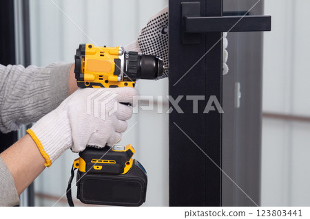 Door hardware installation. 123803441