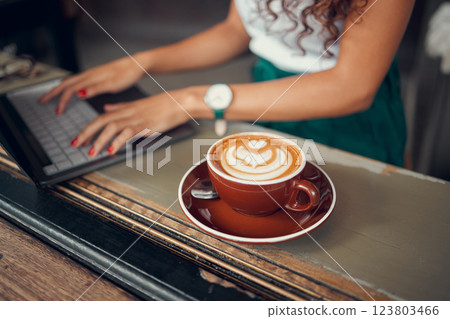 Laptop, typing and a freelance woman with coffee in cafe, writing an email or doing internet research on blog. Freelancer, writer or author working on online project in coffee shop, hands on keyboard Laptop, typing and a freelance woman with coffee in cafe, writing an email or doing internet research on blog. Freelancer, writer or author working on online project in coffee shop, hands on keyboard 123803466