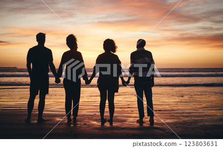 Silhouette, friends and beach sunset holding hands in freedom, support and calm peace in nature together. Back shadow fun couples group relax, summer ocean horizon and tropical vacation in solidarity 123803631