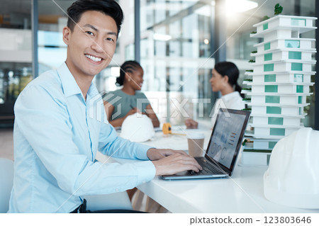 Architect, man with laptop and architecture business, planning strategy and engineering data. Young Asian working, diversity and design model, corporate conference room and smile in portrait. Architect, man with laptop and architecture business, planning strategy and engineering data. Young Asian working, diversity and design model, corporate conference room and smile in portrait. 123803646